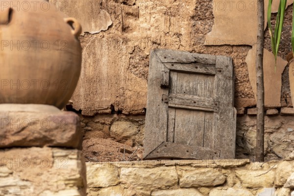 Beautiful old window shutter leaning at a facadeof a house in Agadir, Morocco