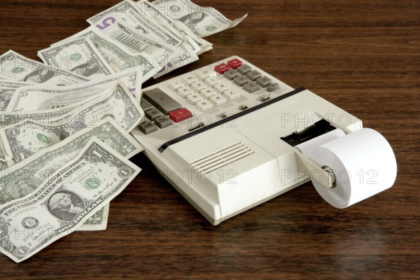 Dollar notes calculator accountant office vintage retro wooden table