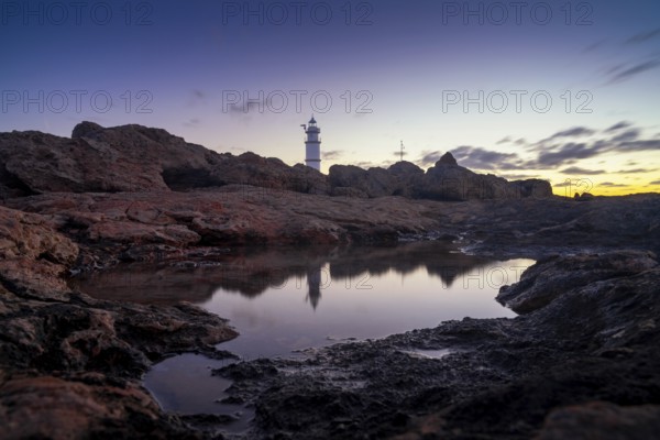 A long exposure view of the Cap de ses Salines Lighthouse on Mallorca at sunrise