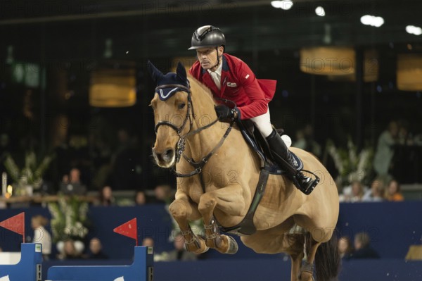Pius Schwizer of Switzerland competes in 1.60m FEI Jumping World Cup at Jumping Amsterdam in Amsterdam, The Netherlands