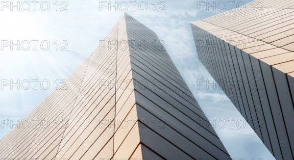 Wall of a modern building on a background of blue sky abstract architectural background