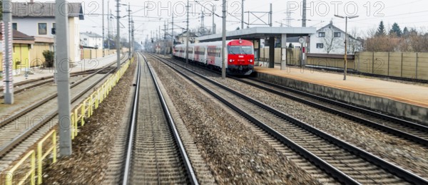 Austria, Upper Austria, Linz, Wels . Railway tracks seen from a moving train between Linz and Wels Austria