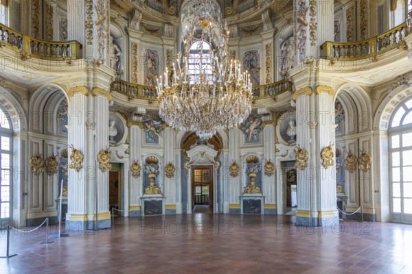 Italy, Stupinigi, January 2023: luxury interior of Royal Palace with baroque marbles and windows