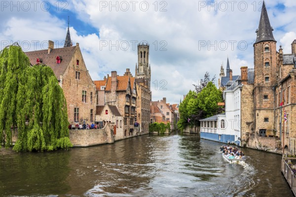BELGIUM, BRUGES - MAY 26: boats full of tourist enjoying the dock of the Rosary on May 26, 2015