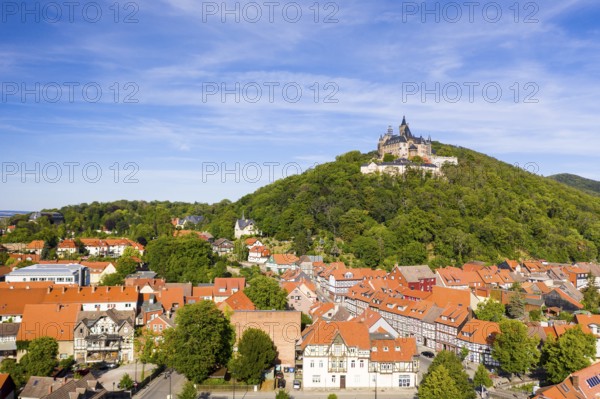 Aerial view of the district Nöschenrode with castle, in the foreground half-timbered houses Schöne Ecke, Wernigerode, Harz, Saxony-Anhalt, Germany