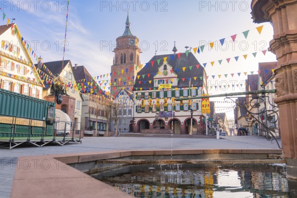 Lively town view with pennants and a bell tower in historical surroundings, Fasnet, Weil der Stadt, Böblingen district, Germany