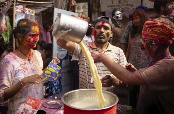 A person selling bhang lassi on a street, during the holi festival, the Hindu spring festival of colours on March 25, 2024 in Guwahati, Assam, India. Holi, also known as the Festival of Colors or the Festival of Spring, is one of the most vibrant and joyous festivals in India