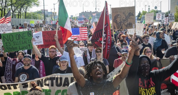 Detroit, Michigan USA - 14 June 2025 - Thousands gathered for a 'No Kings' rally, protesting President Trump's actions against immigrants and against democratic institutions. Afterwards they marched to the ICE office