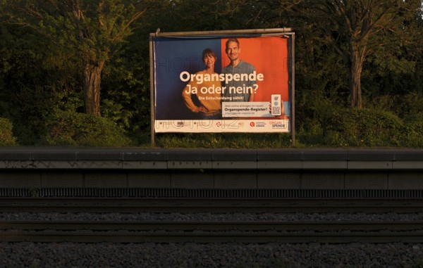 Advertising along a railway line, advertising poster for organ donation, organ donation register, Sommerrain railway station, Stuttgart, Baden-Württemberg, Germany