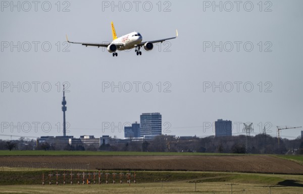 Dortmund Airport, Pegasus Airline, Airbus A320neo, on landing, Turkish low-cost airline, Dortmund skyline with Florian Tower, regional airport