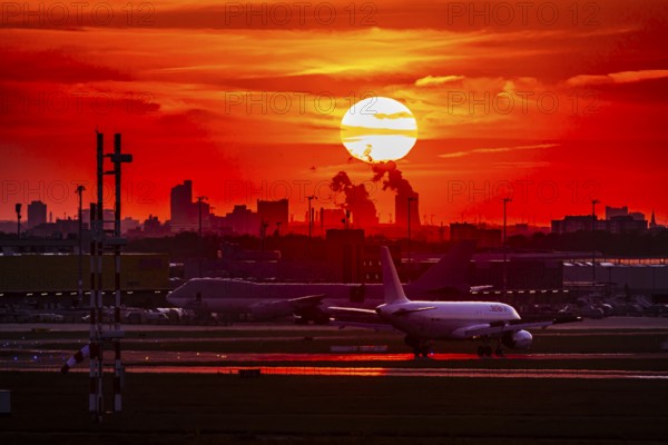 Cologne Bonn Airport in the evening with sunset and sunset. Cologne, North Rhine-Westphalia, Germany