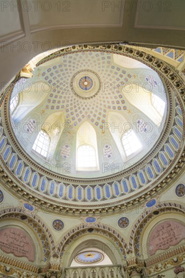 View of the ornately painted interior ceiling with detailed patterns and windows, Mosque, Schwetzingen Palace Gardens, Germany