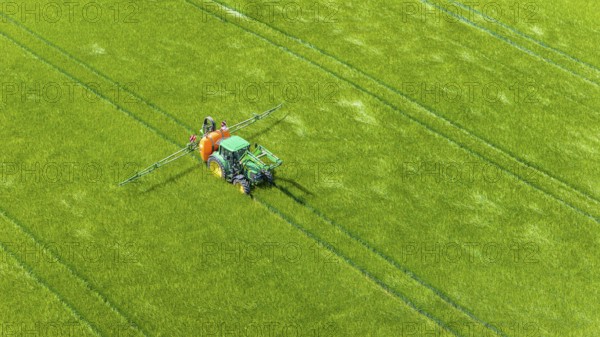 Farmer with tractor working in the field. In early summer, he fertilises the grain for an optimum yield. Drone photo. Merklingen, Baden-Württemberg, Germany