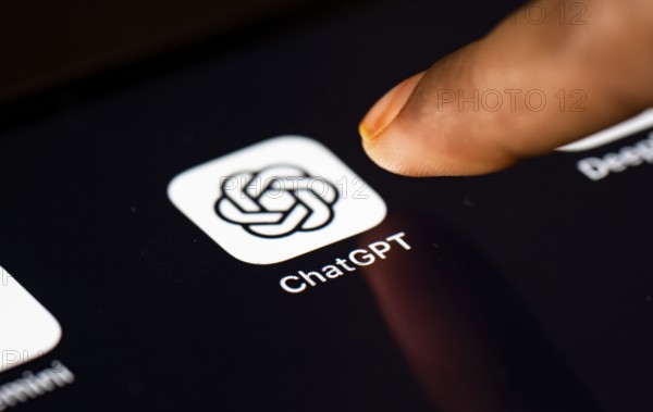 In this photo Illustration a person taps ChatGPT app icon on a tablet device on 24 May 2025 in New Delhi, India