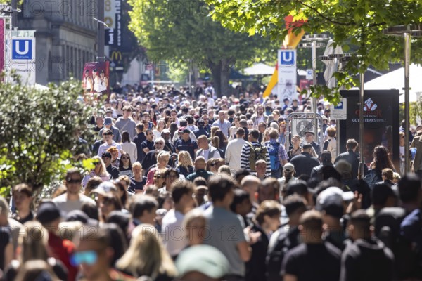 Many people on the way in the pedestrian zone Königsstraße. Crowd in Stuttgart, Baden-Württemberg, Germany