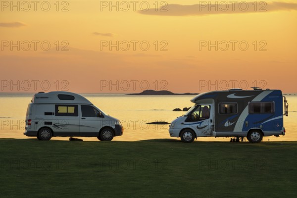Camper vans at the coast, sunset, campsite Fidden, Isle of Mull, Scotland, UK