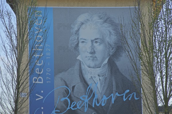 Portrait of the composer Ludwig van Beethoven on a block of flats with signature and year, lifetime, inscription, head, lithograph, monochrome, black and white, grey, blue, mural, street art, wall painting, drawing, building, residential area, Kreuzmatt, Kehl, Ortenau, Baden-Württemberg, Germany