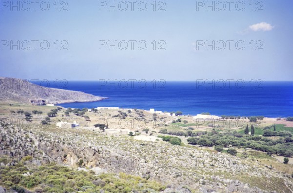 Countryside landscape view over fields to coastline at Kato Zakros, Crete, Greece, Europe 1972