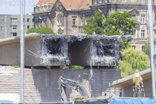 Following the partial collapse of the Carola Bridge, demolition work is continuing. Further bridge segments were deliberately brought to collapse and are being crushed, separated and removed on site. Here, work on another construction road through the Elbe to remove another bridge segment, Dresden, Saxony, Germany