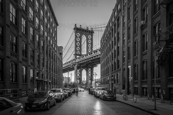 New York, United States of America, November 18, 2016: Pillar of Manhattan Bridge as seen from an alley in Dumbo district in Brooklyn