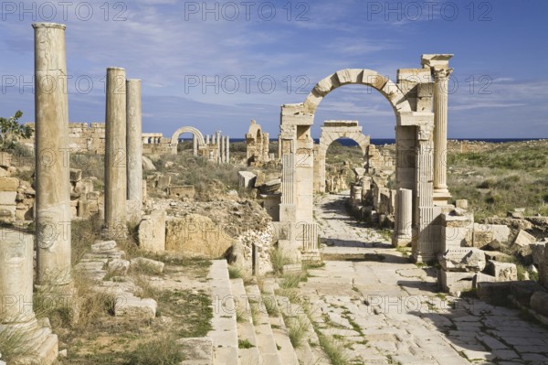 Arch of Trajan, in front of Arch of Tiberius, Via Trionfale, ruined city of Leptis Magna, Libya