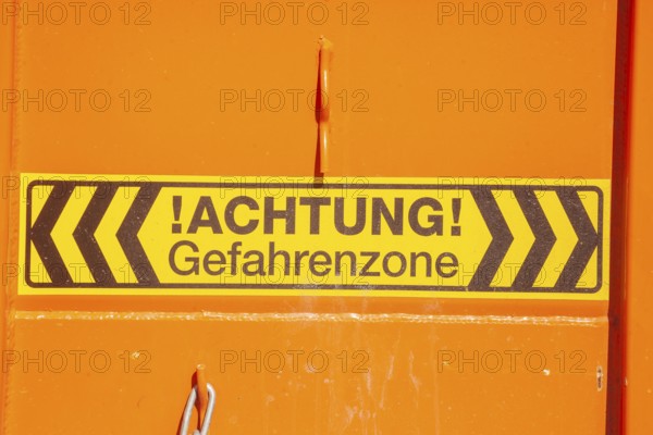 Caution danger zone sign at a construction site, Germany