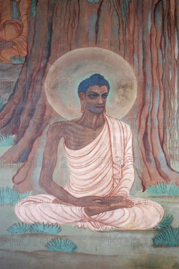 Colourful painting of fasting buddha (meditation position) on wall of mulgandha kuti vihar, sarnath, uttar pradesh, india