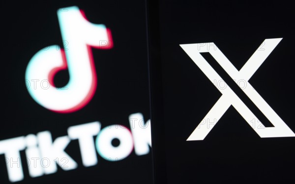 Twitter (X) logo is seen on a smartphone and Tiktok logo in the background