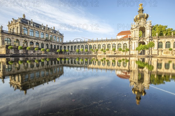 The Dresden Zwinger, a landmark of baroque architecture. Historic buildings in the style of a palace, orangery at sunrise in the morning in the city of Dresden, Saxony, Germany