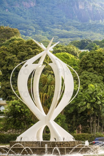 The monument de L'unite (Monument of National Unity) in downtown Vicoria, mahe, Republic of Seychelles, Indian Ocean