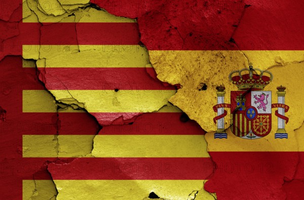 Flags of Sagunto and Spain painted on cracked wall