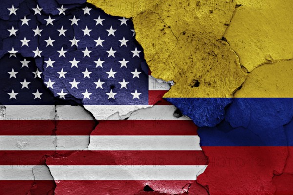 Flags of USA and Colombia painted on brick wall