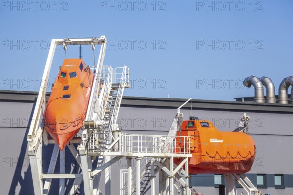 Orange lifeboats on a ship, Bremerhaven, Bremen, Germany