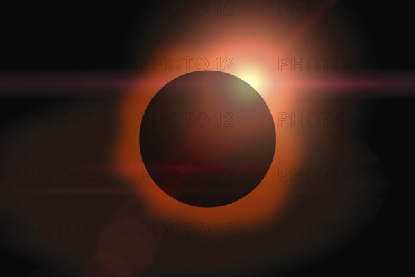 Solar eclipse with orange halo on black sky background
