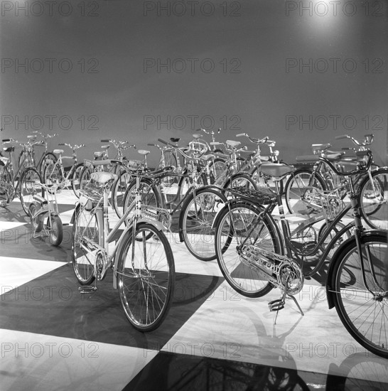 1950s bicycles. Swedish bicycle manufacturer Nymanbolaget built their first bicycles 1888. Here in the 1950s the company was one of the leading bicycle manufacturers in Europe. The picture shows bicycles of different models when making a advertisment 1958. The company marketed itself as producing the World champion bike. Sweden 1958 ref CV9-5