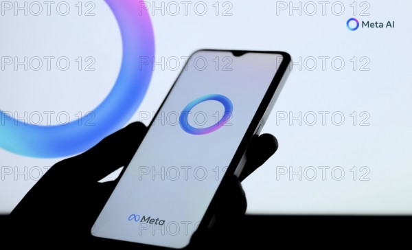 Meta AI logo on smartphone for Facebook Artificial Intelligence.