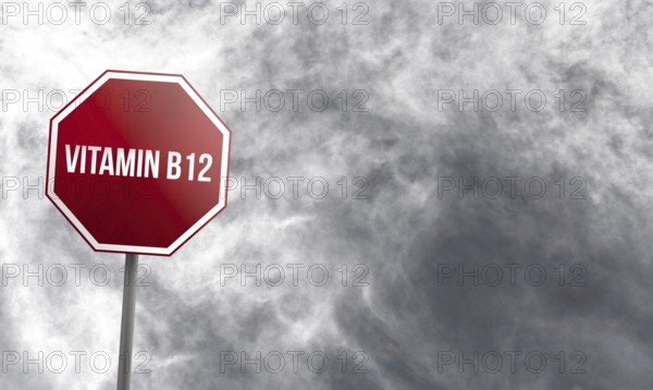Vitamin B12, red sign with clouds in background