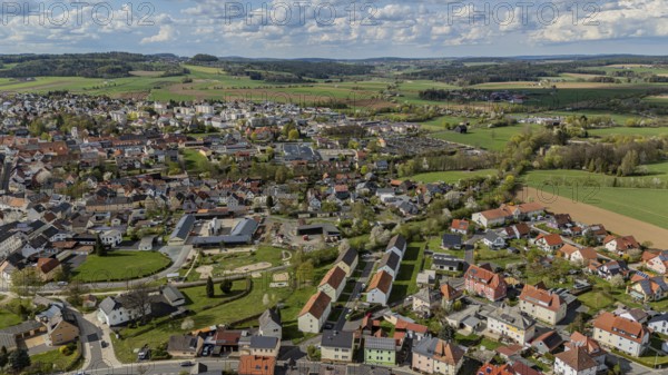 Panorama of a town and surrounding green landscape under a cloudy sky, Mitterteich, Upper Palatinate, Bavaria, Germany