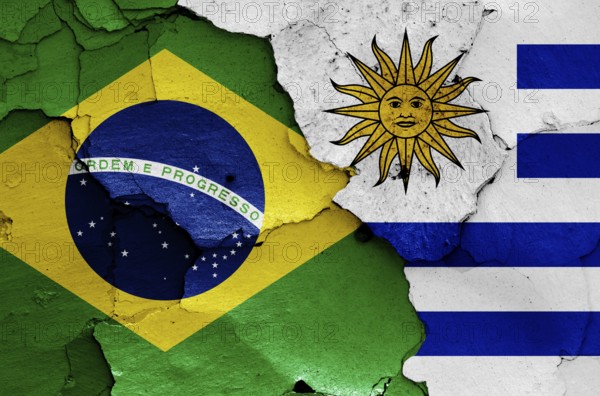 Flags of Brazil and Uruguay painted on cracked wall