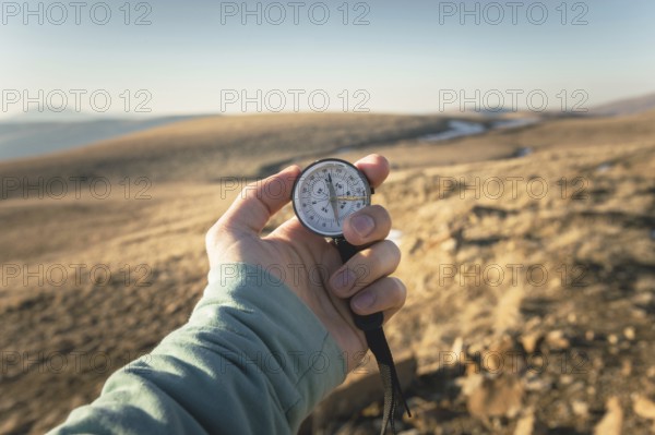 Compass in Hand Natural background .Vintage Tone