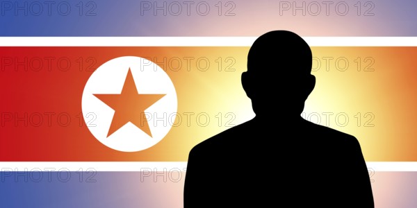 The North Korea flag and the silhouette of an unknown man