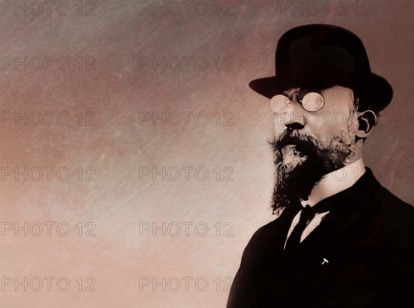 Erik Satie, 1866 – 1925, a French composer and pianist, portrait digitally edited according to a photography, 1909