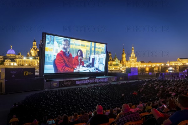The Film Nights on the banks of the Elbe are Germany's largest open-air cinema festival. They have taken place every summer since 1991 on the Neustädter Elbufer in Dresden and have attracted over 200, 000 viewers in recent years. In 2021 the film nights will start with the Radeberger Fimnacht and 60 Years of Bond: No Time to Die