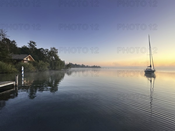 Evening atmosphere, sailing boat on Lake Starnberg, Bavaria, Germany