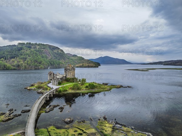 Eilean Donan Castle and Loch Duich from a drone, Isle of Skye, Highlands, Scotland, England, United Kingdom