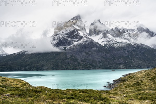 Blue lake Lago Nordenskjöld, Cuernos del Paine mountain range in autumn, Torres del Paine National Park, Magallanes region, Chile