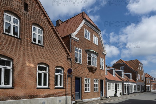 Brick houses along a quiet street, Old Town, Ringkøbing, Ringkøbing Fjord, Denmark