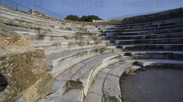 ©Udo Rein, Detailed view of a stone amphitheatre with focus on the curved rows of seats, Ancient Theatre, Kos Town, Kos, Dodecanese, Greek Islands, Greece
