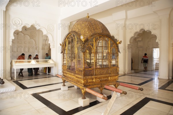 Golden palanquin in the Mehrangarh or Meherangarh fortress, Jodhpur, Rajasthan, India