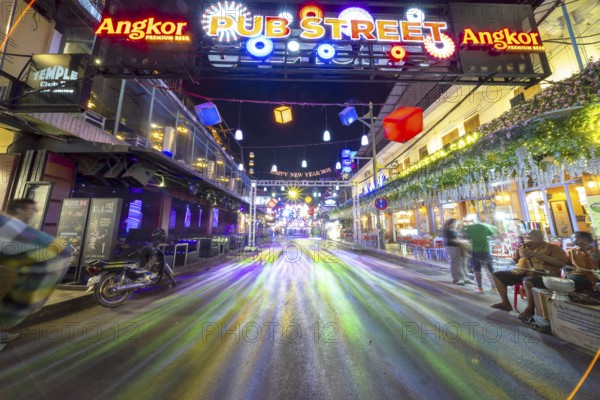 Neon lights, Pub Street in the evening, entertainment district with bars and restaurants, Siem Reap, Cambodia